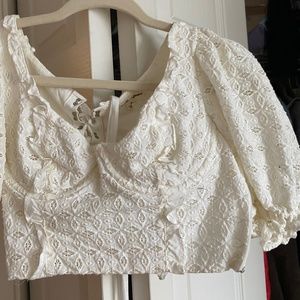 For Love and Lemons white eyelet lace crop top with ribbon corset detail